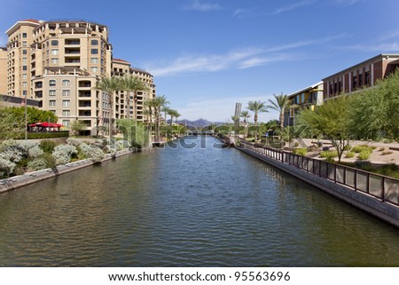 Buildings along the Salt River Project canal in Scottsdale Arizona\'s waterfront district.
