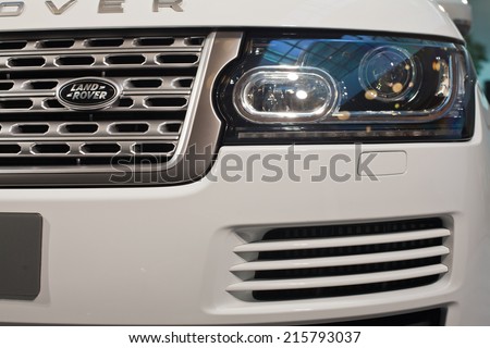 BUCHAREST, ROMANIA - September 08 , 2014: All-New Range Rover Vogue SE car on display in showroom. Jaguar Land Rover employs 25,000 people and sells vehicles in 170 countries around the world.