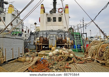 Rusty old winch fishing trawler nets