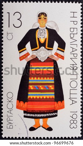 BULGARIA- CIRCA 1983: A stamp printed in Bulgaria shows  young woman in traditional Bulgarian costume ,series, circa 1983