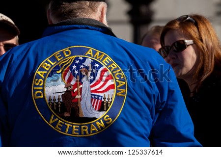 HARRISBURG, PA - JANUARY 19: An unidentified women talks to a disabled American veteran before the \