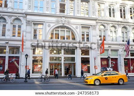 NEW YORK - DECEMBER 27: A taxi drives past Home Depot on West 23rd Street on December 27, 2014 in New York.