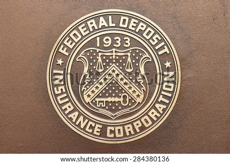 WASHINGTON, DC - MAY 4: Federal Deposit Insurance Corporation plaque in Washington, DC on May 4, 2015. Its mission is to maintain stability and public confidence in the nationâ??s financial system.