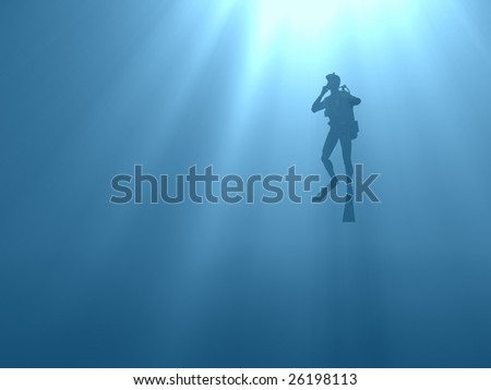 scuba diver emerging from the abyss in a dark blue sea towards light of surface