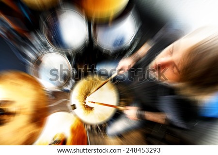 Man playing the drum.Live music abstract background concept.Drummer and rock music