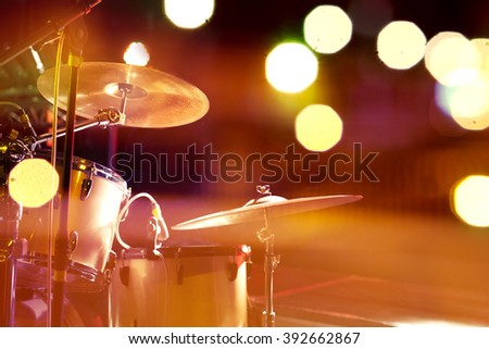Live music background.Drum on stage and concert lights