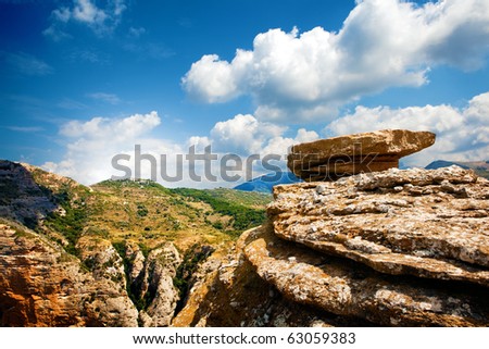 mountain landscape with a rock on top