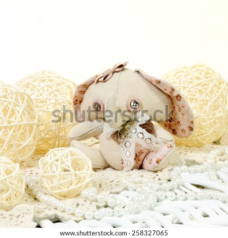 handmade spring fantasy provence style soft elephant on the straw balls background isolated on white
