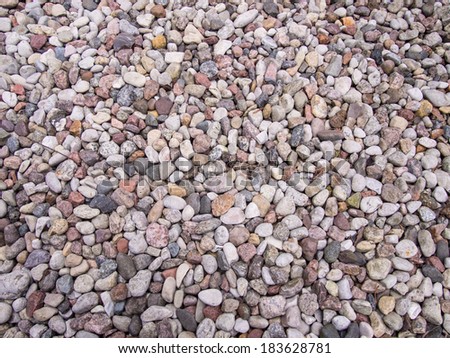 Gravel is composed of unconsolidated rock fragments that have a general particle size range and include size classes from granule- to boulder-sized fragments.