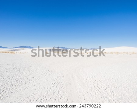 White Sands National Monument is a field of white sand dunes composed of gypsum crystals. It is the largest gypsum dune field in the world.