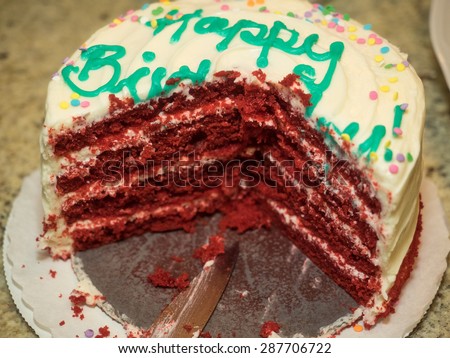 Red velvet cake is a cake with either a dark red, bright red or red-brown color. It's traditionally prepared as a layer cake topped with cream cheese or cooked roux icing.