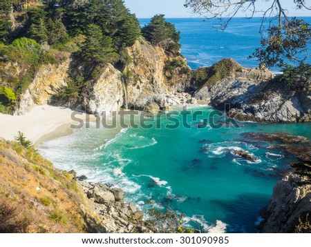 McWay Falls is an 80-foot waterfall located in Julia Pfeiffer Burns State Park that flows year-round.