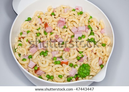 Macaroni and cheese is a common casserole, it is a combination of cooked macaroni (tubular) dried pasta and a cheese sauce.