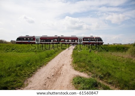 A train is a connected series of vehicles for rail transport that move along a track  (permanent way) to transport freight or passengers from one place to another.