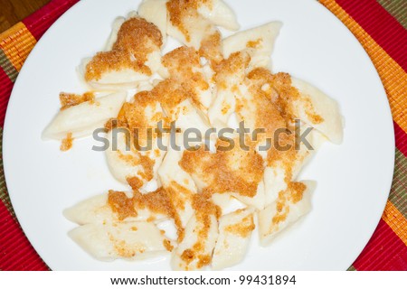 Lazy pierogi - dumplings made from cottage cheese , eggs and flour, cooked in lightly salted water.