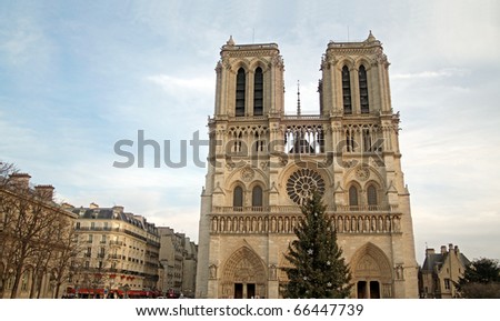 Notre Dame de Paris: Notre Dame cathedral in Paris, France under cold winter sky.