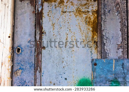 Background texture with old galvanized metal, rusts, scrapes, scratches, cracks and woods. Modern vintage style.