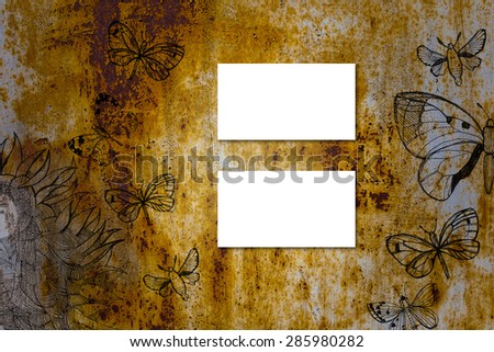 Horizontal business card mockup over painted rustic metal table background. Card is 50x90mm. Painted rustic metal have doodle pictures with sunflowers and
