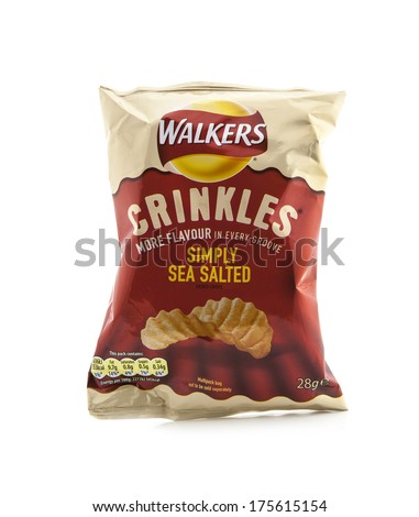 SWINDON UK FEBRUARY 5 2014 Bag of Walkers Crinkles Simply Sea Salted crisps isolated on a white background Walkers is a British snack food manufacturer SWINDON UK FEBRUARY 5 2014 Bag of Walkers Crinkles Simply Sea Salted crisps isolated on a white background Walkers is a British snack food manufacturer