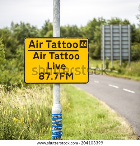 FAIRFORD, UNITED KINGDOM, JULY 08: Sign for Air Tattoo Live Radio at the  Royal International Air Tattoo JULY 08 2014 in Fairford.