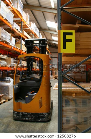 Fork Lift Truck in Warehouse