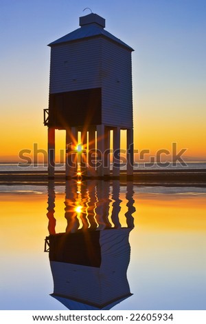Burnham-on-sea nine leg low lighthouse at sunset