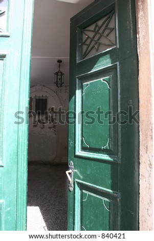 Open green door in Dubrovnik, Croatia.