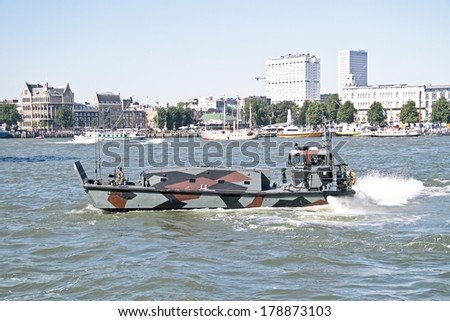 ROTTERDAM, HOLLAND - SEPTEMBER 09, 2013: Marine ship is cruising during the world harbor days, Netherlands.