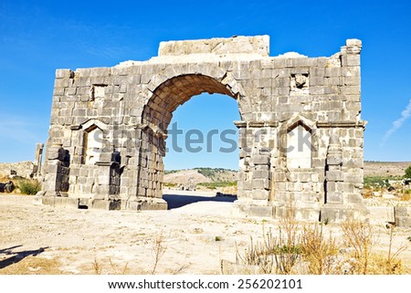 Old gate at Volubilis in Morocco. Volubilis is a partly excavated Roman city in Morocco situated near Meknes between Fes and Rabat.