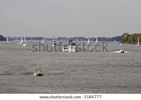 Boating and sailing on the river Waal in the  Netherlands