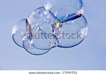 Soap bubbles against a blue sky