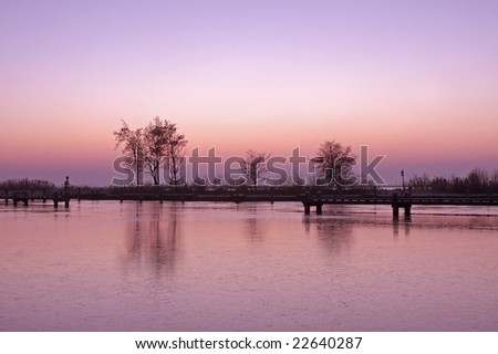 Purple sunset in wintertime in the Netherlands