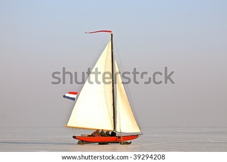 Traditional dutch: Ice sailing on a cold winter day on the Gouwzee in the Netherlands