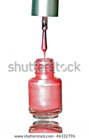 pink nail polish bottle. stock photo : Pink nailpolish dripping into the ottle