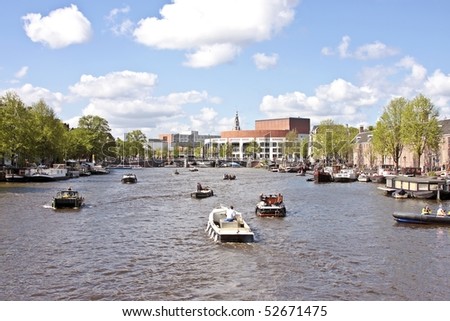 Cruising on the river Amstel in Amsterdam citycenter the Netherlands