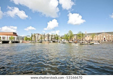 The city Amsterdam in the Netherlands with the river Amstel