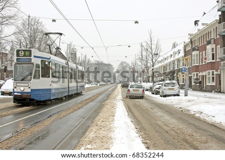 Tram driving in Amsterdam the Netherlands in winter