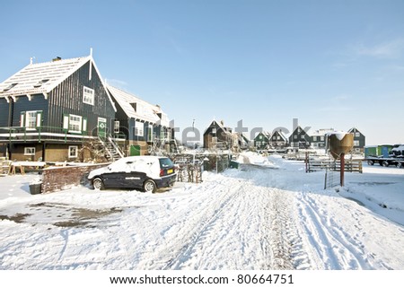 Traditional village Marken with wooden houses in winter in the Netherlands