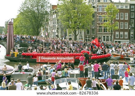 AMSTERDAM - AUGUST 6: Amsterdam boat participates in Canal Parade on Gay Pride weekend, August 6, 2011, Amsterdam, the Netherlands.