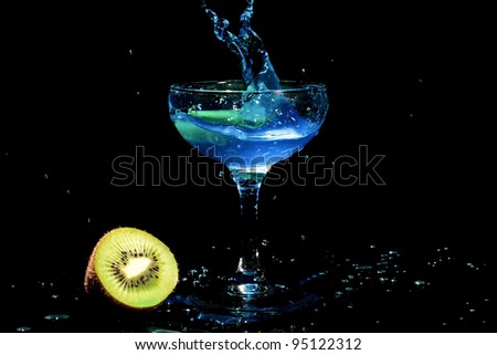 Blue cocktail splash with kiwi fruit