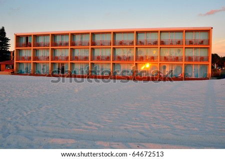 Apartment building on the beach in front of the Gulf Coast sea, in St. Petersburg, Florida