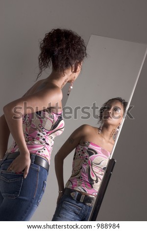 party girl standing in front of a mirror, more pictures of her in my gallery