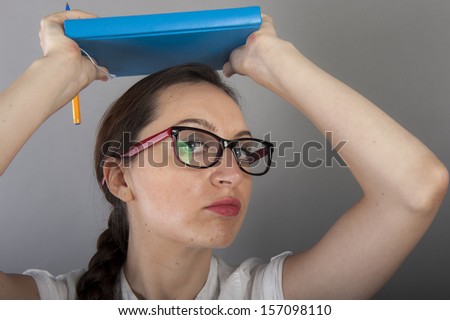 an image of young female student learns