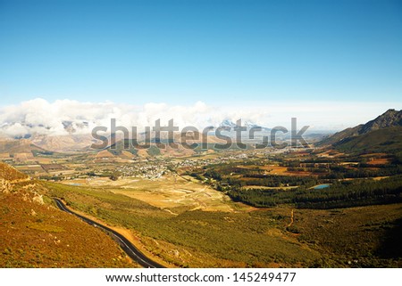 Landscape of the famous Franschhoek Valley wine region in the Western Cape of Southern Africa as seen from the top of the surrounding mountains