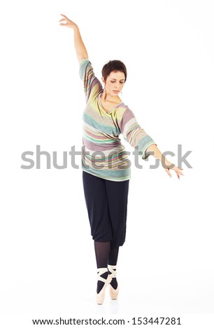 Modern female ballet dancer with black pants and a colorful striped jersey en pointe on a white background in various ballet positions.