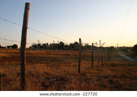 Fence post at sunset