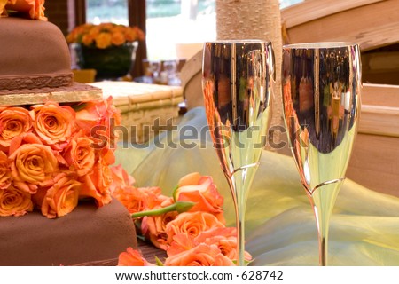 stock photo Table with champagne glasses and wedding cake