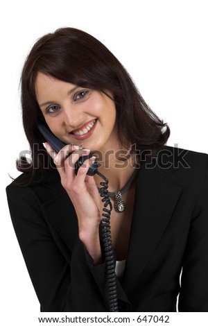 Business woman in formal black suit, holding phone, smiling