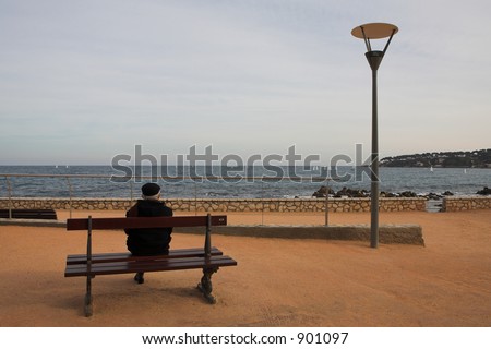 Man on Bench, next to the sea