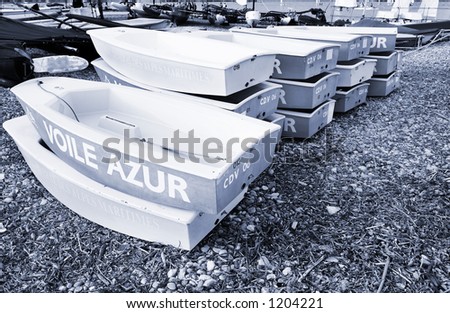 Boats piled on top of each other in Antibes, France.  Duo tone.
